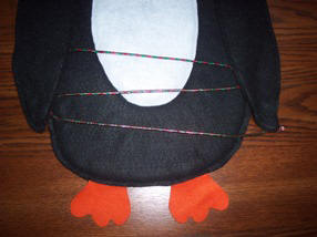 Craft a string of lights for your Christmas penguin to hold.